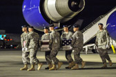 Army carry team carries the transfer case containing the remains of Capt. Michael W. Newton, 30, of Newport News, VA upon arrival at Dover Air Force Base, DE on June 14, 2011. The Department of Defense announced the death of Newton who was supporting Operation Enduring Freedom – Afghanistan.
