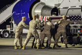 A Marine carry team carries the transfer case containing the remains of L/Cpl. Sean M. O’Connor, 22, of Douglas, WY upon arrival at Dover Air Force Base, DE on June 14, 2011. The Department of Defense announced the death of O’Connor who was supporting Operation Enduring Freedom – Afghanistan.