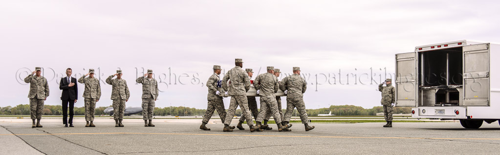 Air Force Chief of Staff Gen. Mark Welsh, Eric Fanning, undersecretary of the Air Force, Chief Master Sergeant of the Air Force James Cody, Maj. Gen. Jim Keffer and Dignified Transfer Host Col. Richard G. Moore Jr. stand at attention during the dignified transfer of four airmen at Dover Air Force Base in Dover, DE.  The airmen died in an MC-12 crash April 27 in Afghanistan.