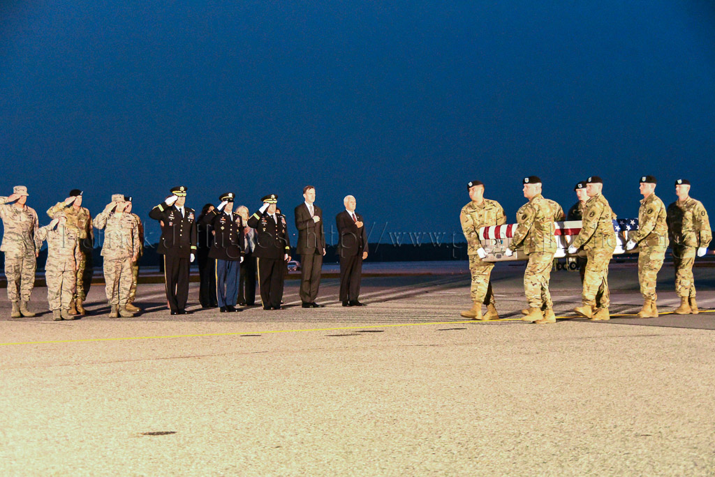 A solemn dignified transfer of remains is conducted upon arrival at Dover Air Force Base, DE, from the aircraft to a transfer vehicle to honor those who have given their lives in the service of our country.