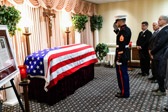 Marine escort Staff Sgt. Emmanuel Diazfor for PFC Michael L. Salerno offers a salute to his brother Marine.