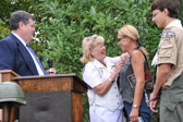 The Gold Star Mothers National Monument Foundation's Distinguished Service Medal for engineering the establishment of the GSM honor plaque was presented to Brenda Einhorn of Rolling Thunder® Inc. NJ Chapter 2.