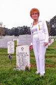 Gold Star Mother Christine Devlin from Massachusetts at the gravesite of a friend.