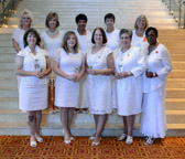 The 2014-15 National Executive Board. Pictured back row, l to r, Lorna Harris, National Flag Guard; Becky Christmas, National Sergeant-at-Arms, Ann Davis: National VAVS Chairman; Cindy Tatum, National Recording Secretary; Sue Pollard; National Chaplain, front row, l to r Maria Martens, National Treasurer; Cindy Kruger, National First Vice President; Jennifer Jackman, National President; Candy Martin, National Second Vice President; and Mona Gunn, National Banner Guard.