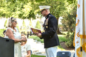 American Gold Star Mothers National President Sue Pollard presented Lt. General Daniel O 'Donohue with 'A History of the Gold Star Mothers' book.