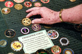 Cindy Tatum, National 1st Vice-President places an American Gold Star Mothers challenge coin.