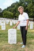 Gold Star Mother Judi Tapper stands at her son's gravesite in Section 60 of Arlington Nation Cemetery, Petty Officer First Class David M. Tapper was killed in action while serving in Afghanistan on August 20, 2003.
