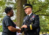 Reflections in Section 60, Arlington National Cemetery.  Mona Gunn, National President Of The American Gold Star Mothers, Inc speaks with the 36th Vice Chief Of Staff Of The Army General James C. McConville