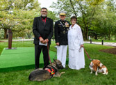 Gold Star Dad Andy Tatum and his service dog Millie, Commandant of the Marine Corps General David H. Berger, Cindy Tatum American Gold Star Mothers Inc. National President with Linus her service dog