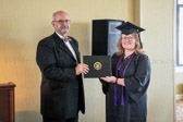Gold Star Mother Kathy Mullins was presented with her diploma from Waldorf University.