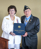 Hershel "Woody" Williams presents Medal Of Honor book to Cindy Tatum National President, American Gold Star Mothers