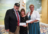 Jack McManus, Vietnam Veterans of America presented two checks to Gold Star Mothers