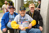 Major General Peter M. Aylward (USA Ret), kneeling on right, spent some time honoring those Veterans in DC on an Honor Flight visit.
