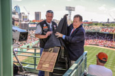 Joe D'Entremont, President Mass 1 Rolling Thunder® and Dr. Charles Steinberg Senior Advisor to the President/CEO, Boston Red Sox unveil before the July 4, 2013 ballgame their POW-MIA chair at Fenway Park.