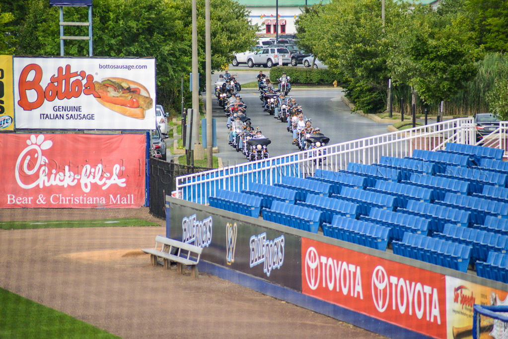 Lead by the Vietnam Vets M/C bikes approach Frawley Stadium.