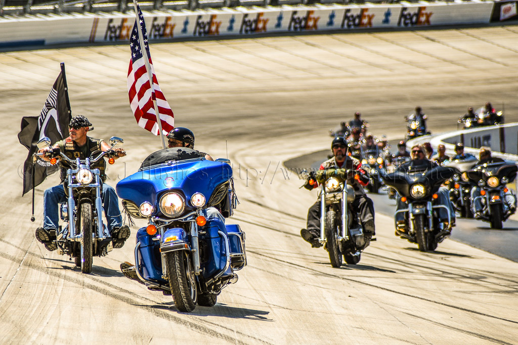 A part of the ceremonies included a slow procession of 141 motorcycles, 182 individuals around the “Monster Mile” track.  <br /><br />The riders will be lead in by the Vietnam Vets M/C Chapter E  Pennsylvania.<br /> <br />Rider with the American Flag is Ronald W. Knowles US Navy Veteran Second Brigade M/C<br />Southern Chapter Quarter Master Road name....”Gilligan”<br /><br />Rider with the POW-MIA flag is Ken “Murdoc” Massey, Brothers At Arms, Vice President,  US Marine Corps and National Guard Veteran