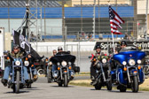 Before the start of the “Fed Ex 400 benefiting Autism Speaks” on the Monster Mile at Dover International Speedway Veterans rode their bikes in a ceremonial lap around the track before the dedication of the POW-MIA National Chair of Honor.