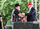 Vietnam War Medal of Honor receipant Gary George Wetzel welcomes Donald J. Trump to the stage.