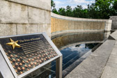 The Price Of Freedom<br />Freedom Wall holds 4,048 gold stars.  Each gold star<br />represents one hundred American service personnel<br />who died or remain missing in the war.  The 405,399<br />American dead and missing from World War II are<br />second only to the loss of more than 620,000<br />Americans during our Civil War.