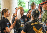Elaine Muller goes over last minutes instructions for sales team leaders.<br /><br />The sales of pins, patches help to defray some of the major expenses for hosting Rolling Thunders 1st Amendment demonstration “Ride For Freedom”