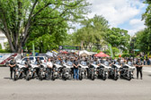 Currently, the Motor Unit consists of forty-two full-time motor officers who make up six decentralized motor squads. The squads are assigned to each of the six district police stations and are under the command of a sergeant. The primary missions of the squads are traffic enforcement, collision reduction, pedestrian safety and maintaining the orderly flow of traffic in the county. The squads are also involved in special details to include, dignitary and Presidential escorts, funeral escorts, the Montgomery County Fair, the Tiger Woods Golf Tournament and numerous foot races and parades.