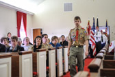 A Scout from Troop 355 leads the Upper Darby Marine Corps League Detachment #884 Color Guard into ceremonies.