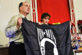 PA State Representative Steve Barrar presents a POW-MIA flag to Brian for Scout troop 355.
