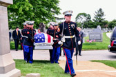 Marine carry team transports the remains of retired Sargent Major Alfred L. DeSerio to his final resting spot