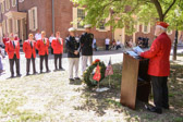 MC Fred LeClair saying a brief prayer following the wreath laying ceremony.