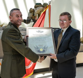 Mr. Mark Noah was presented the title of Honorary Marine by Major General James W. Lukeman on July 24, 2015 during ceremonies at the National Museum of the Marine Corps, Triangle, VA