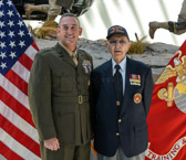 Major General James W. Lukeman with U.S. Marine Corps Maj (ret) C. J. Daigle, from Cincinnati, Ohio, who was also recognized for his service during the Battle of Tarawa