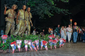 On Friday evening of Memorial Day weekend a Candle light vigil is held by Rolling Thunder® Inc. with the Gold Star Mothers and family members starting at the apex of The Wall, then visiting the Nurses statue ending at the statue of the Three Soldiers.