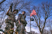 In order to portray the major ethnic groups that were represented in the ranks of U.S. combat personnel that served in Vietnam, the statue's three men are purposely identifiable as Euorpean American  (the lead man), African American (man on right), and Latin American (man on left).