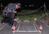 Mike ‘Doc’ Spresser, has made a bamboo frame with all military service ensigns to outline the 'In Memory' plaque.  | 302-265-5154