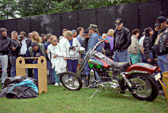 A custom built never riden motorcycle was left at 'The Wall' during Memorial Day weekend 1995 by Vietnam Veterans from Wisconsin. The license plate is stamped "HERO." The plate was retired by the governor of Wisconsin. The bike's extended fork is festooned with 37 dog tags which are representative of the 37 casualties and missing in action of Wisconsin.