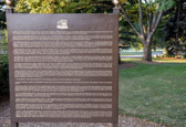 Under authority of Public Law 972, 84th Congress, approved August 3, 1956, four unknown Americans who lost their lives while serving overseas in the Armed Forces of the United States during the Korean Conflict were exhumed from the National Cemetery of the Pacific in Hawaii. On May 15, 1958 Master Sergeant Ned Lyle, US Army, holding a carnation wreath stood momentarily silent before the four identical flag-draped caskets. He placed the wreath on the end casket to signify the selection of the Korean War Unknown. The remaining unknown Americans were reinterred at the National Cemetery of the Pacific. The Unknown of Korea was transported to the Cruiser Canberra to join the Unknown of World War II. At sea off Norfolk, Virginia, the Unknowns of World War II and Korea were transferred to the Destroyer Blandy, which brought them to the Nation's Capitol. Upon their arrival on May 28, 1958 the Unknowns were taken to the Rotunda of the Nation's Capitol, to rest in state until Memorial Day, May 30, 1958. The Unknowns were then moved to the Memorial Amphitheater in Arlington National Cemetery and there before the distinguished guests, the President awarded the Medal of Honor to each. After the services, they were borne to this plaza, and following religious rites, they received a 21 Gun Salute. The services concluded with the firing of three volleys and the sounding of Taps.