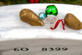 The tops of many grave stones are now a place for small Mementoes.