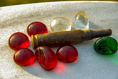 The tops of many grave stones are now a place for small Mementoes.