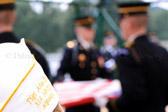 Christina Kazakavage Gold Star Mother of TSgt Adam K. Ginett KIA 1/19/10 watch’s the flag folding ceremony.