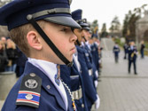 C.A.P. Honor Guard member Sherwood stands at attention awaiting arrival of WAA