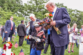 Christian shows off a photograph and other mementos of his Marine Father that he Never got to meet.