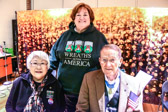 Gold Star Mother Judy Faunce standing with Medal Of Honor recipient Colonel Roger Donlon and his wife Norma.