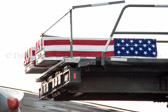 The transfer cases of Spc. Daniel P. Drevnick and Spc. James Wertish resting on the K-loader.