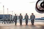 Carry team boards aircraft along with the<br />Dignified transfer officer, senior ranking officer and chaplain