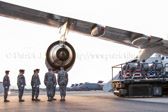 Carry team carries transfer case of Spc. Carlos E. Wilcox IV to end of K-loader