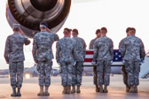 Carry team carries transfer case of  Spc. Carlos E. Wilcox IV to the mortuary transfer vehicle