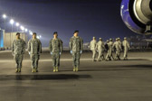 Dignified Transfer Officer Colonel Manson O. Morris, U.S. Air Force, Senior Ranking Officer Brig. Gen Thomas A. Horlander, U.S. Army, Chaplin Major Timothy Bach, U.S. Air Force  and carry team board aircraft