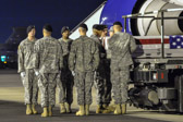 Carry team carries transfer case of Sgt. Aaron M. Smith  to the mortuary transfer vehicle