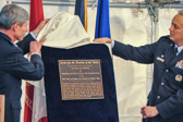 The dedication plaque reads: The heroes of our generation are making the supreme sacrifice in protection of freedom and promotion of peace.  Though they will never see the fulfillment of the dream for which they died, we honor their service, their courage, and their families.  They, and their families, hold a cherished place in our hearts and in the history of these United States.  We are compelled by their sacrifice to offer the love which protects, always trusts, always hopes, and always perseveres.  We will never forget and we will always provide the care, service, and support they have earned.