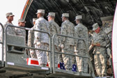Chaplin Lt. Col. Douglas Arendsee, U.S. Air Force offers prayer for the fallen on board the aircraft.